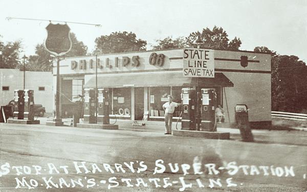 vintage 1940s Phillips 66 gas station, black and white photo